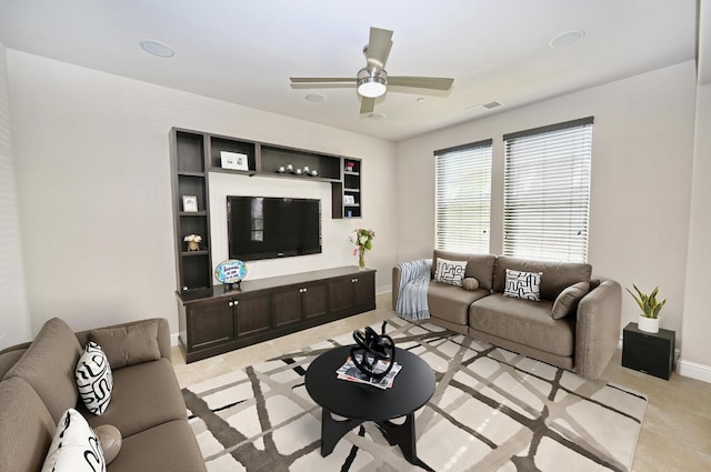 11332 N Cherry Sage Ave, Fresno, CA 93730 - living room with ceiling fan and baseboards
