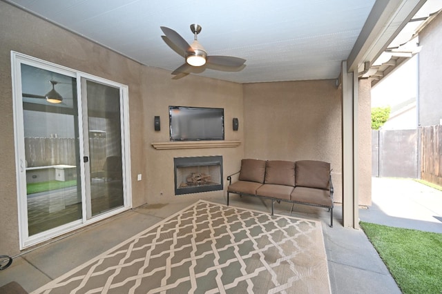 11332 N Cherry Sage Ave, Fresno, CA 93730 - view of patio featuring an outdoor living space with a fireplace, fence, and ceiling fan