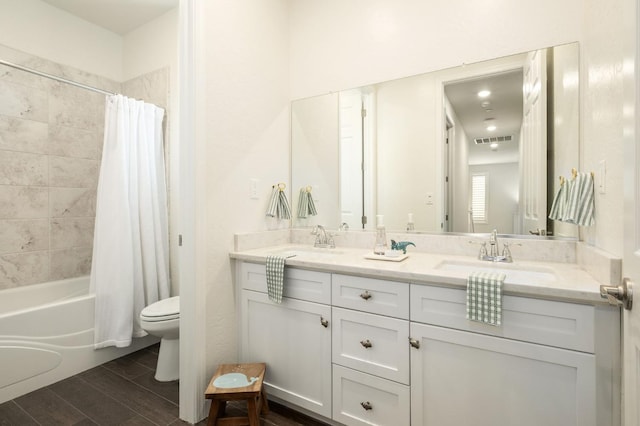1362 E Via Viola Way, Fresno, CA 93730 - full bathroom with toilet, double vanity, wood tiled floors, and shower / tub combo