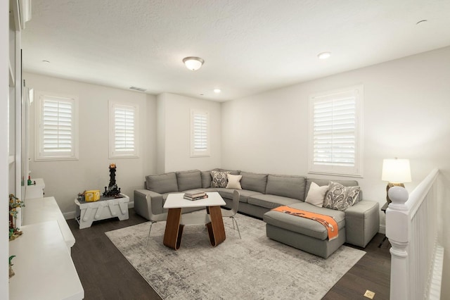 1362 E Via Viola Way, Fresno, CA 93730 - living area with healthy amount of natural light, dark wood-style floors, baseboards, and recessed lighting