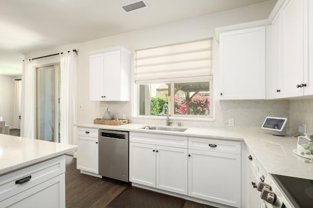 1362 E Via Viola Way, Fresno, CA 93730 - kitchen with dishwasher, a sink, backsplash, dark wood-style flooring, and white cabinetry