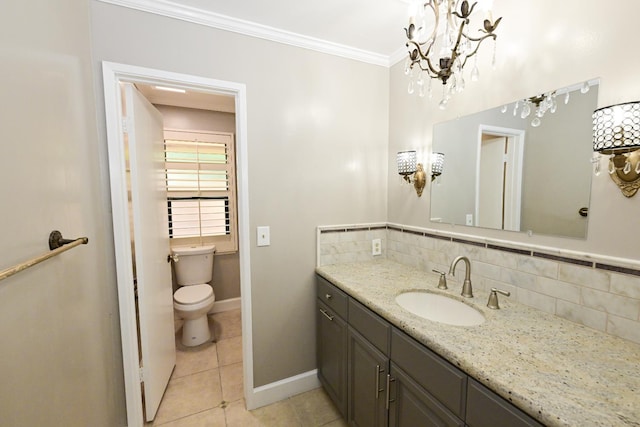 5088 N Forkner Ave, Fresno, CA 93711 - bathroom featuring vanity, decorative backsplash, tile patterned floors, ornamental molding, and a chandelier