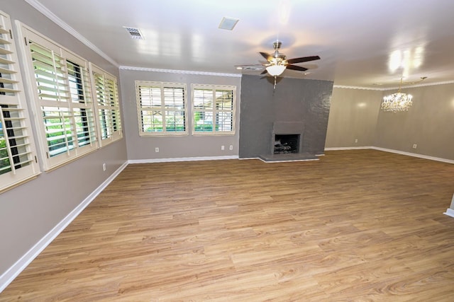 5088 N Forkner Ave, Fresno, CA 93711 - unfurnished living room with a chandelier, light wood-type flooring, ornamental molding, a ceiling fan, and a fireplace