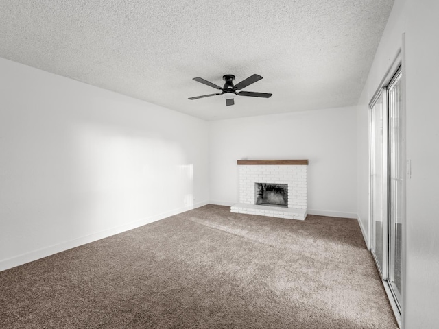 2332 S Jackson Ave, Fresno, CA 93725 - unfurnished living room featuring carpet, ceiling fan, a textured ceiling, a fireplace, and baseboards