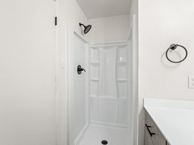 2332 S Jackson Ave, Fresno, CA 93725 - full bathroom featuring a shower stall and vanity