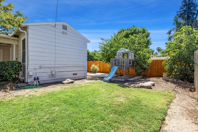 view of yard featuring a playground