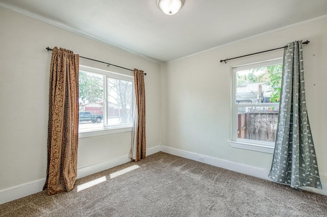 4487 E Bend Ave, Fresno, CA 93702 - empty room with crown molding, carpet flooring, and baseboards