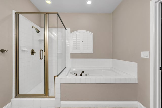10717 N Bunkerhill Dr, Fresno, CA 93730 - full bath with a stall shower, a garden tub, and recessed lighting
