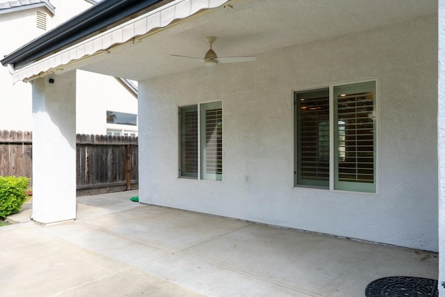 10717 N Bunkerhill Dr, Fresno, CA 93730 - view of patio / terrace with fence and ceiling fan