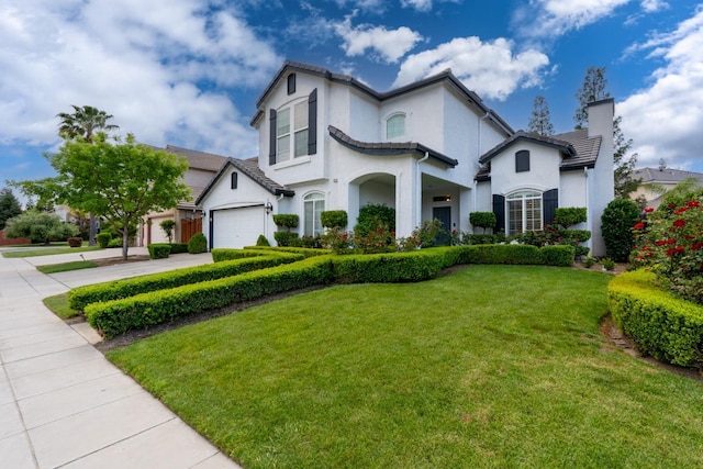 10717 N Bunkerhill Dr, Fresno, CA 93730 - view of front of home with concrete driveway, a chimney, stucco siding, and a front yard