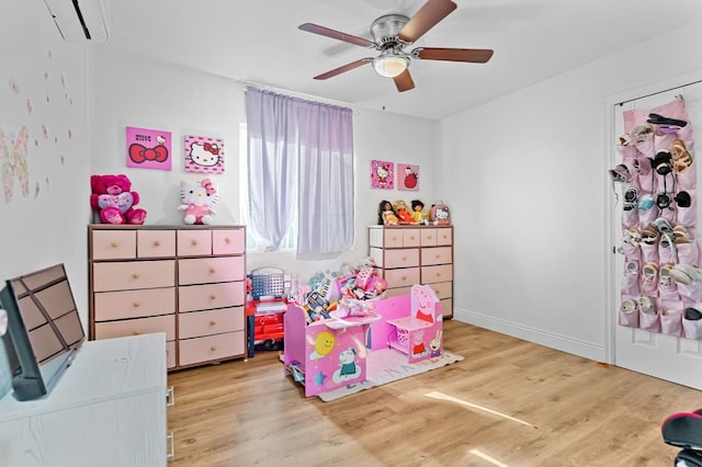 2157 Locust St, Selma, CA 93662 - bedroom with wood finished floors, ceiling fan, and baseboards