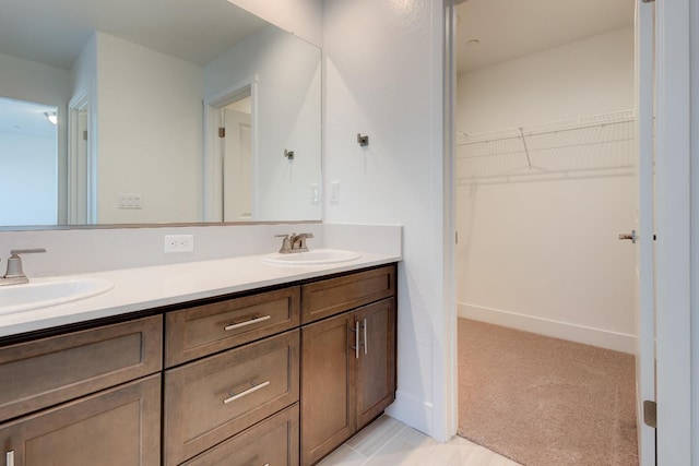 495 Thunder Rd S, Madera, CA 93636 - full bathroom featuring double vanity and a spacious closet