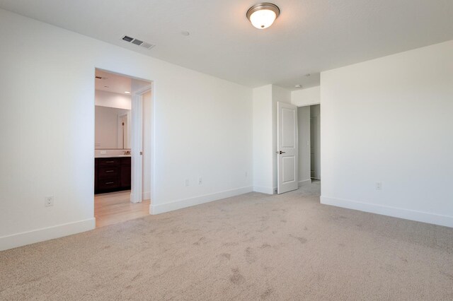 495 Thunder Rd S, Madera, CA 93636 - spare room featuring light colored carpet and baseboards