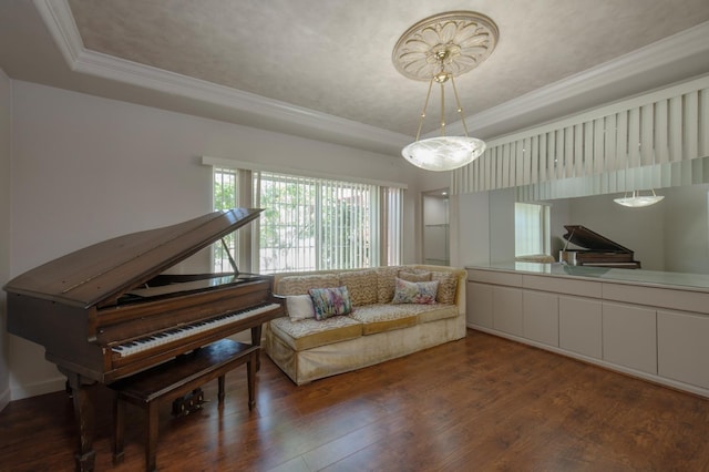 8067 E Belmont Ave, Fresno, CA 93737 - living area featuring a tray ceiling, ornamental molding, and hardwood / wood-style floors