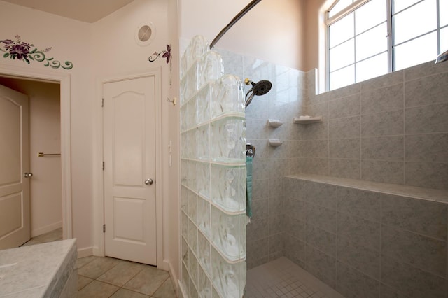 8067 E Belmont Ave, Fresno, CA 93737 - full bathroom featuring walk in shower and tile patterned flooring