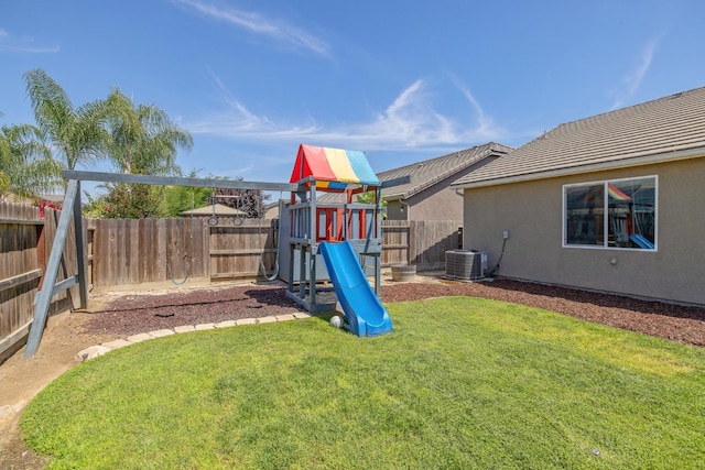 6326 W Sweet Ct, Visalia, CA 93291 - view of yard featuring a playground and central air condition unit
