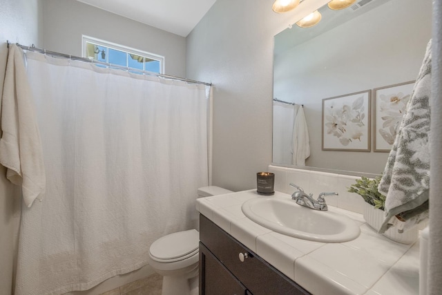 6326 W Sweet Ct, Visalia, CA 93291 - bathroom featuring toilet, vanity, and a shower with shower curtain