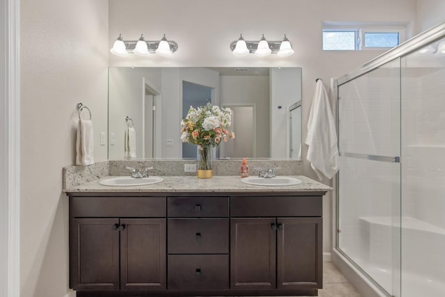 6326 W Sweet Ct, Visalia, CA 93291 - bathroom with a shower stall, double vanity, and tile patterned floors