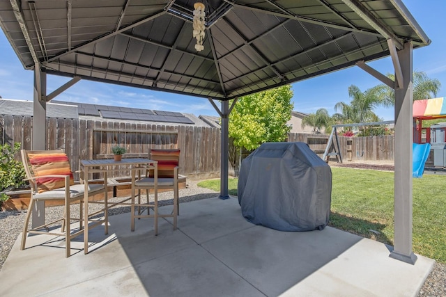 6326 W Sweet Ct, Visalia, CA 93291 - view of patio / terrace with outdoor dining space, a playground, a gazebo, and grilling area