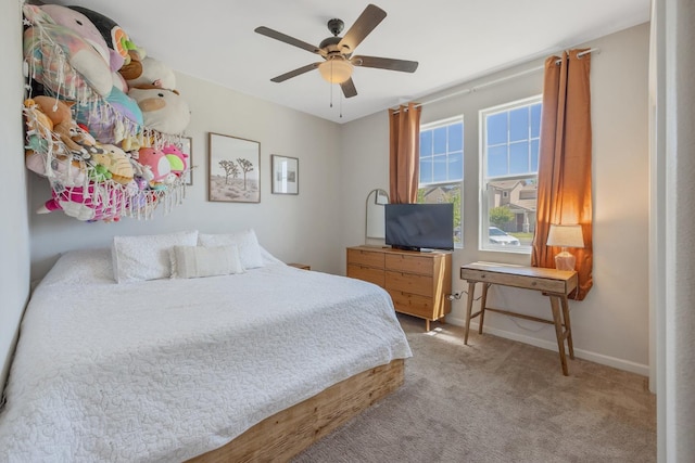 6326 W Sweet Ct, Visalia, CA 93291 - bedroom featuring light carpet, baseboards, and ceiling fan