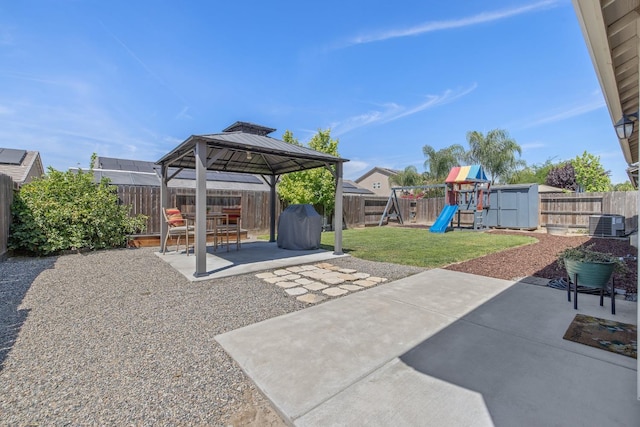 6326 W Sweet Ct, Visalia, CA 93291 - view of patio featuring a gazebo, a playground, and a shed