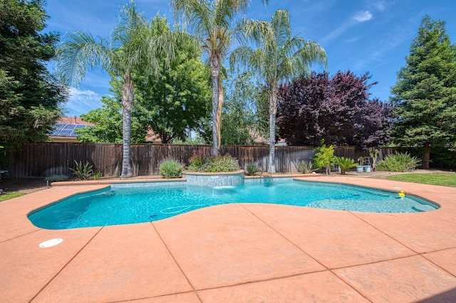 view of pool featuring a patio and a fenced backyard