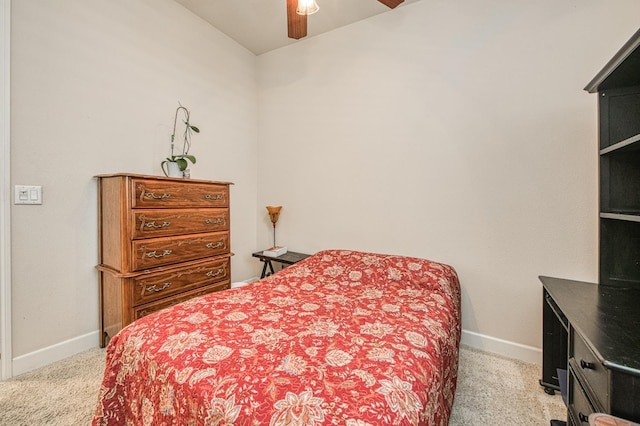 bedroom featuring carpet floors, baseboards, and a ceiling fan