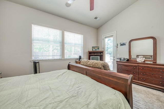bedroom with lofted ceiling, carpet floors, ceiling fan, and access to exterior