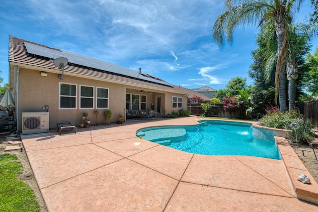 view of pool featuring ceiling fan, a patio, a fenced backyard, and a cooling unit