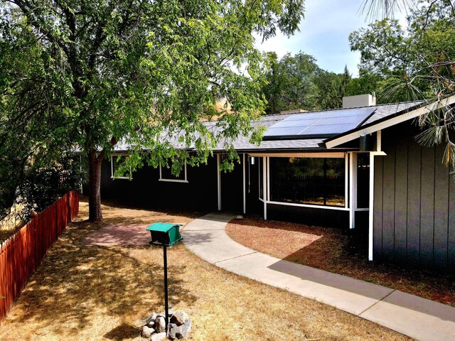41549 Long Hollow Dr, Coarsegold, CA 93614 - ranch-style home featuring solar panels and a shingled roof