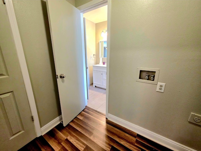 41549 Long Hollow Dr, Coarsegold, CA 93614 - washroom with wood finished floors, hookup for a washing machine, baseboards, and hookup for an electric dryer