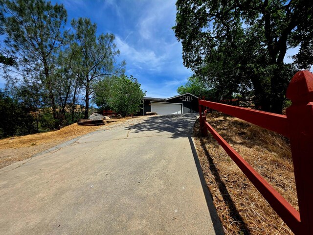 41549 Long Hollow Dr, Coarsegold, CA 93614 - view of front of home with concrete driveway and a garage