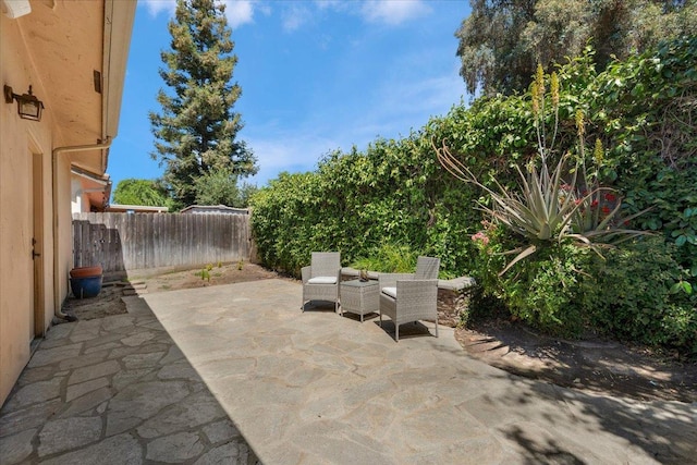 view of patio / terrace with fence