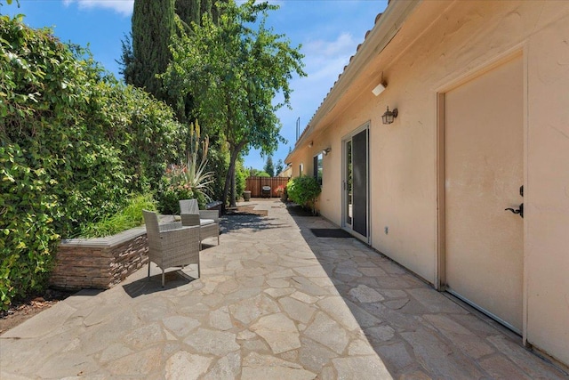 view of patio with fence
