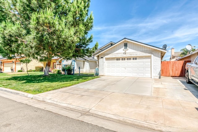 2670 N Katy Ave, Fresno, CA 93722 - ranch-style home featuring a garage
