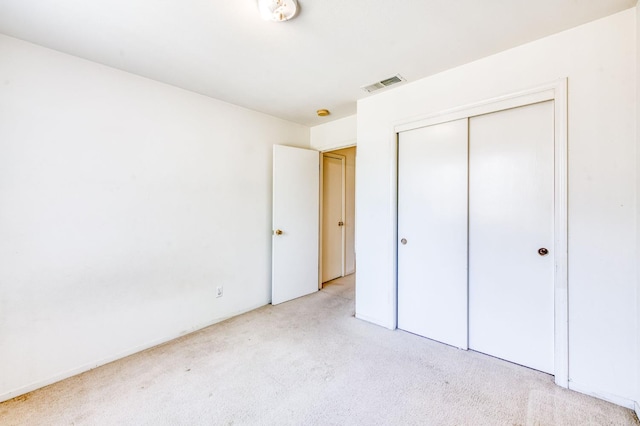 2670 N Katy Ave, Fresno, CA 93722 - unfurnished bedroom with carpet floors and a closet