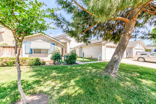 2670 N Katy Ave, Fresno, CA 93722 - view of front of property with a garage and driveway