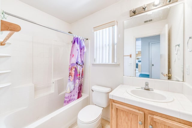 2670 N Katy Ave, Fresno, CA 93722 - bathroom with shower / bathtub combination with curtain, toilet, and vanity