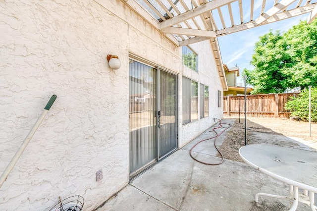 2670 N Katy Ave, Fresno, CA 93722 - view of patio / terrace featuring fence and a pergola