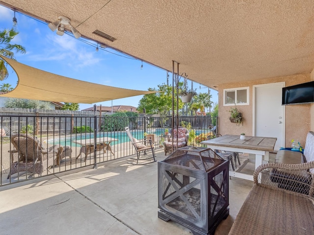 view of patio / terrace with fence