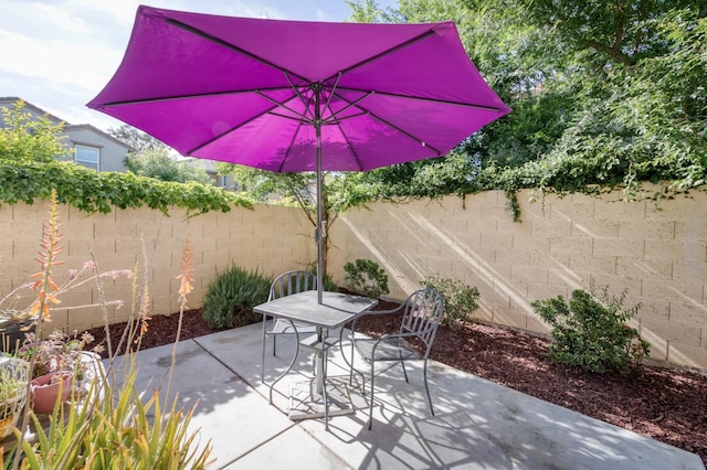 3507 Significant Way, Clovis, CA 93619 - view of patio featuring a fenced backyard and outdoor dining area