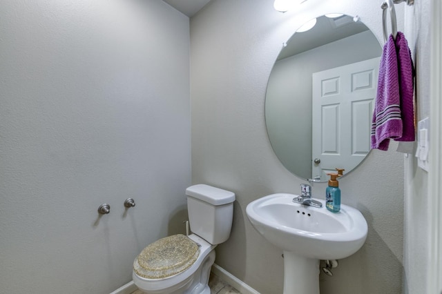 3507 Significant Way, Clovis, CA 93619 - half bathroom featuring toilet and baseboards