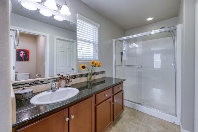 3507 Significant Way, Clovis, CA 93619 - bathroom featuring vanity, a stall shower, toilet, and tile patterned flooring