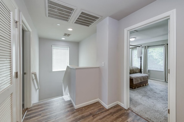 3507 Significant Way, Clovis, CA 93619 - hall with an upstairs landing, plenty of natural light, wood finished floors, baseboards, and recessed lighting