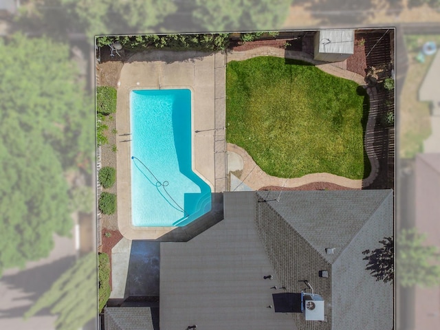 drone / aerial view of a pool