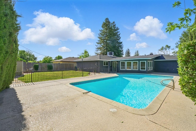 view of pool featuring a patio area and central AC