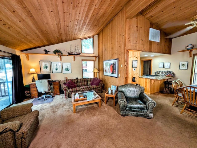 41016 Woodridge Ln, Shaver Lake, CA 93664 - carpeted living room with wooden ceiling, wood walls, an office area, and high vaulted ceiling