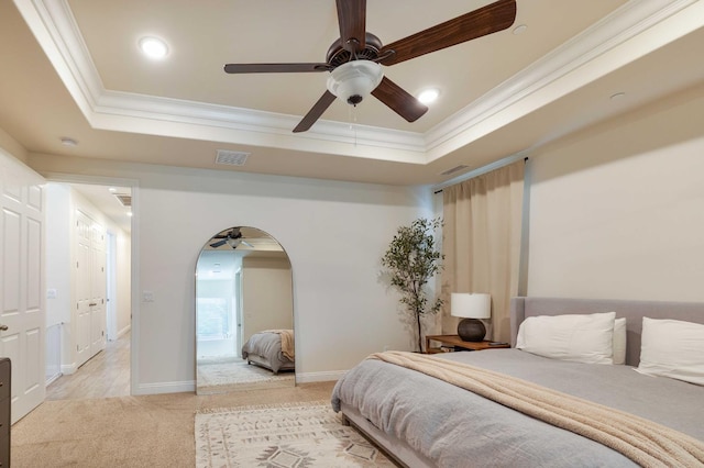 2506 20th Ave, Kingsburg, CA 93631 - bedroom with ornamental molding, light colored carpet, arched walkways, a raised ceiling, and recessed lighting