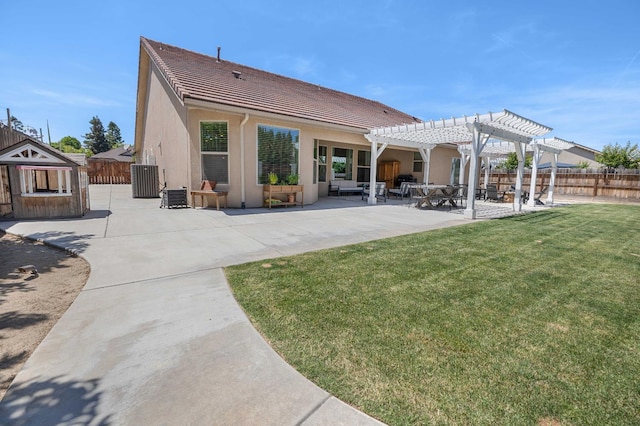 2506 20th Ave, Kingsburg, CA 93631 - rear view of property with a pergola, a tile roof, a patio, cooling unit, and stucco siding