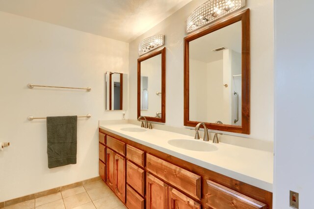 42177 Lone Olive Ln, Ahwahnee, CA 93601 - full bath featuring double vanity and tile patterned flooring